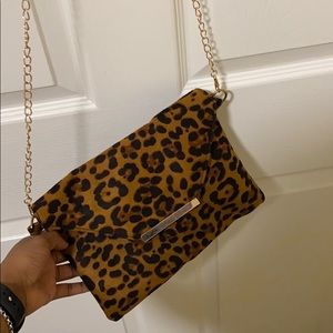 leopard or cheetah print clutch purse